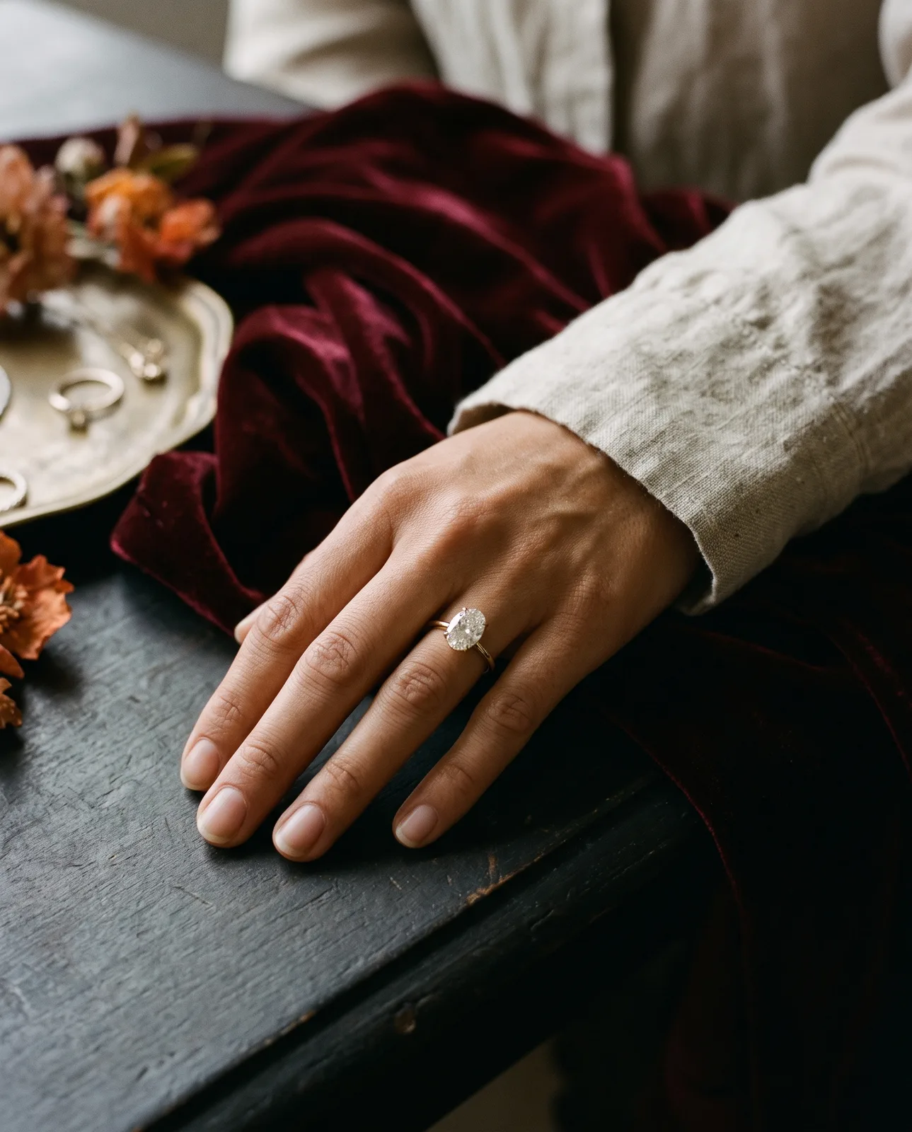 Oval diamond solitaire ring on a hand