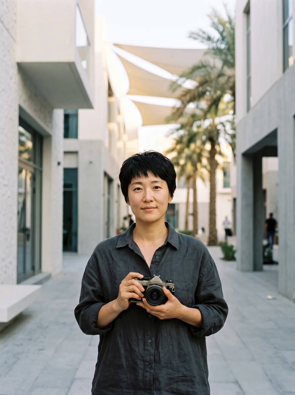 Juno Park holding a camera